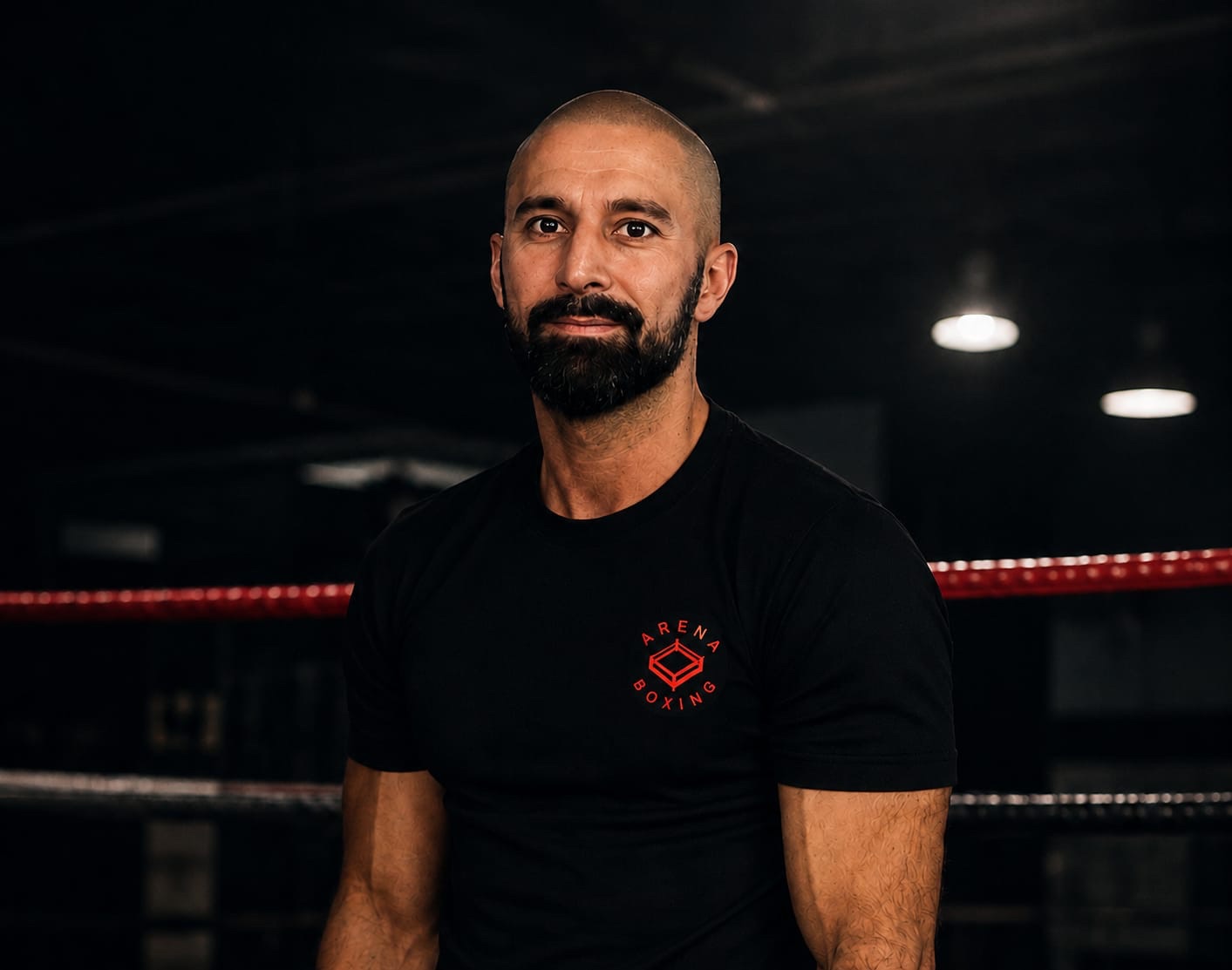 Arena Boxing Club Head Coach Amir Saghalati wearing his coaching kit