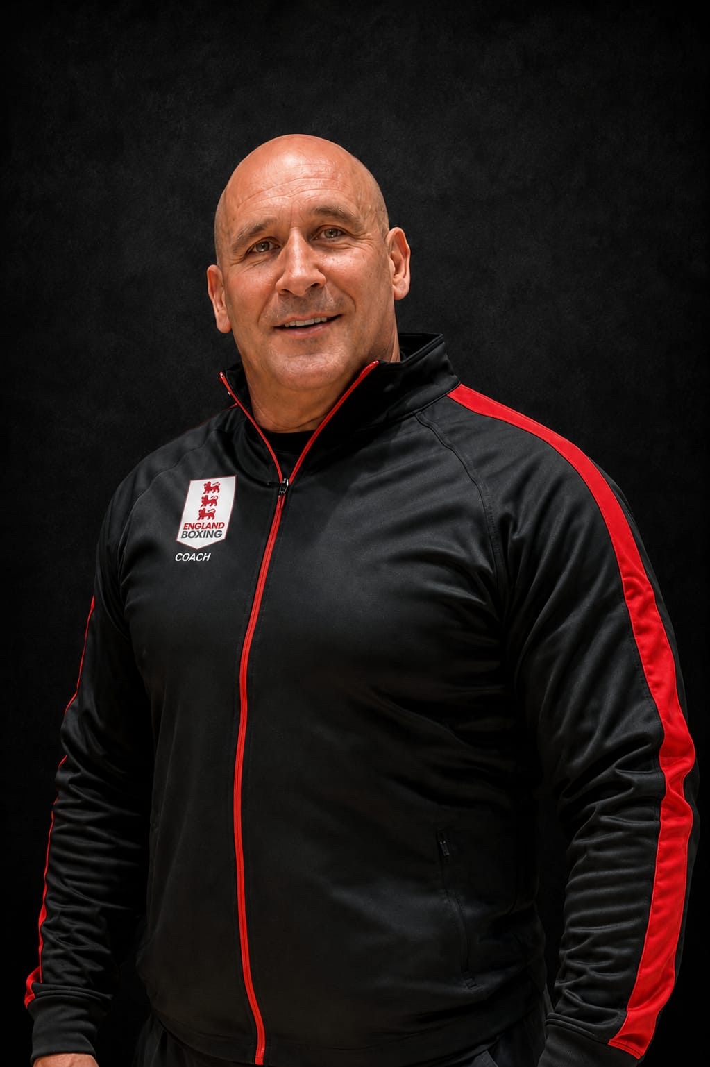 Arena Boxing Club England Boxing coach Geoff Page wearing his Arena coaching kit